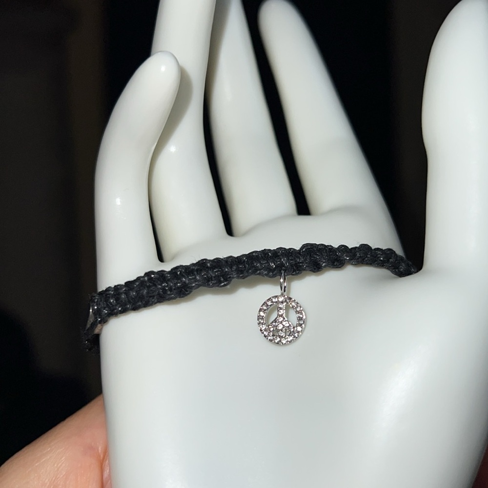 New Macrame Bracelet with fossil “PEACE” charm.